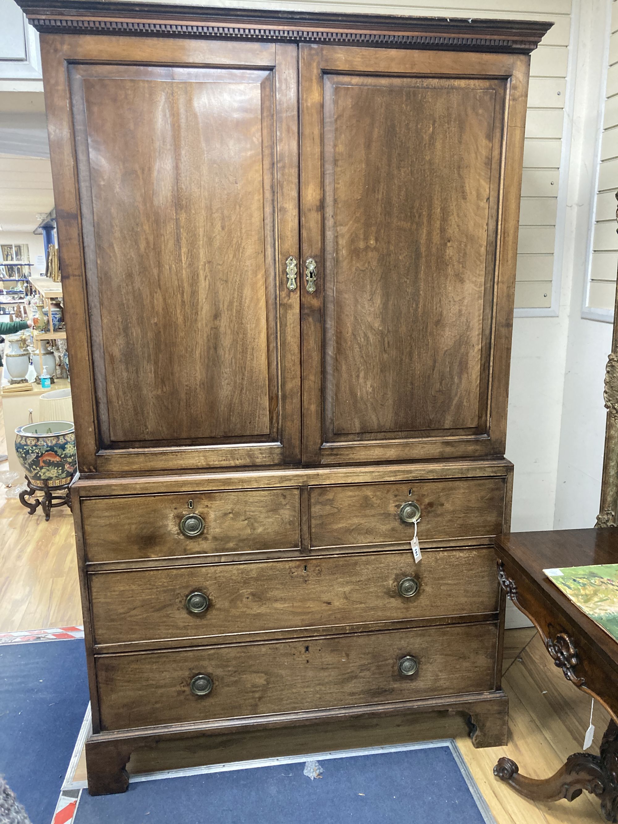 A George III mahogany linen press, width 126cm, depth 62cm, height 210cm